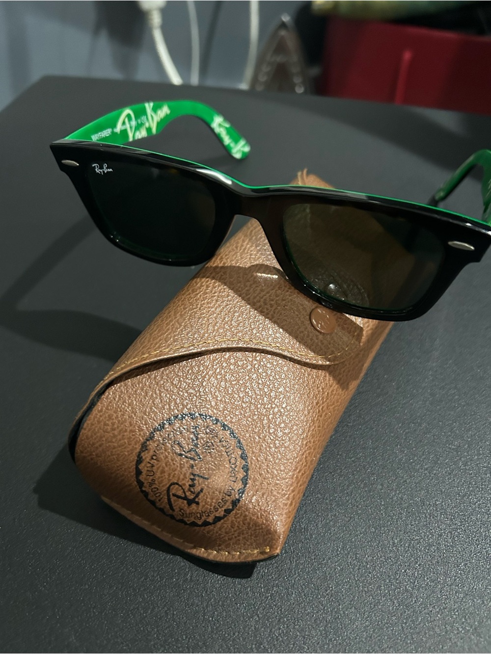 Ray-Ban Black Frame Sunglasses with Green Temples